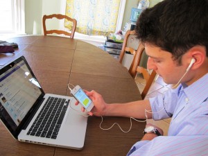 Maza reads using the Learning Ally Audio app with synchronized VOICEText on his iPhone.