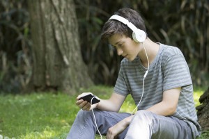 Teen Boy Ear Reading