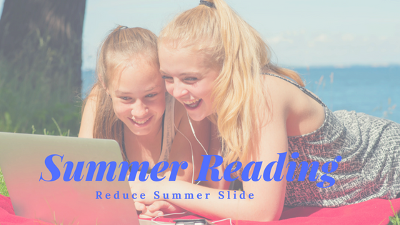 Girls Reading on Beach