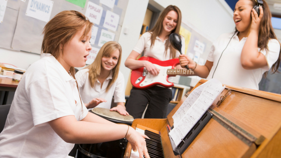 Happy Students Playing Music