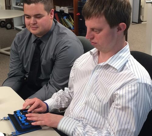 Students using assistive technology