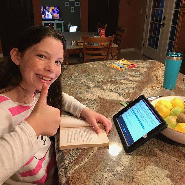 Tween studying with audiobook